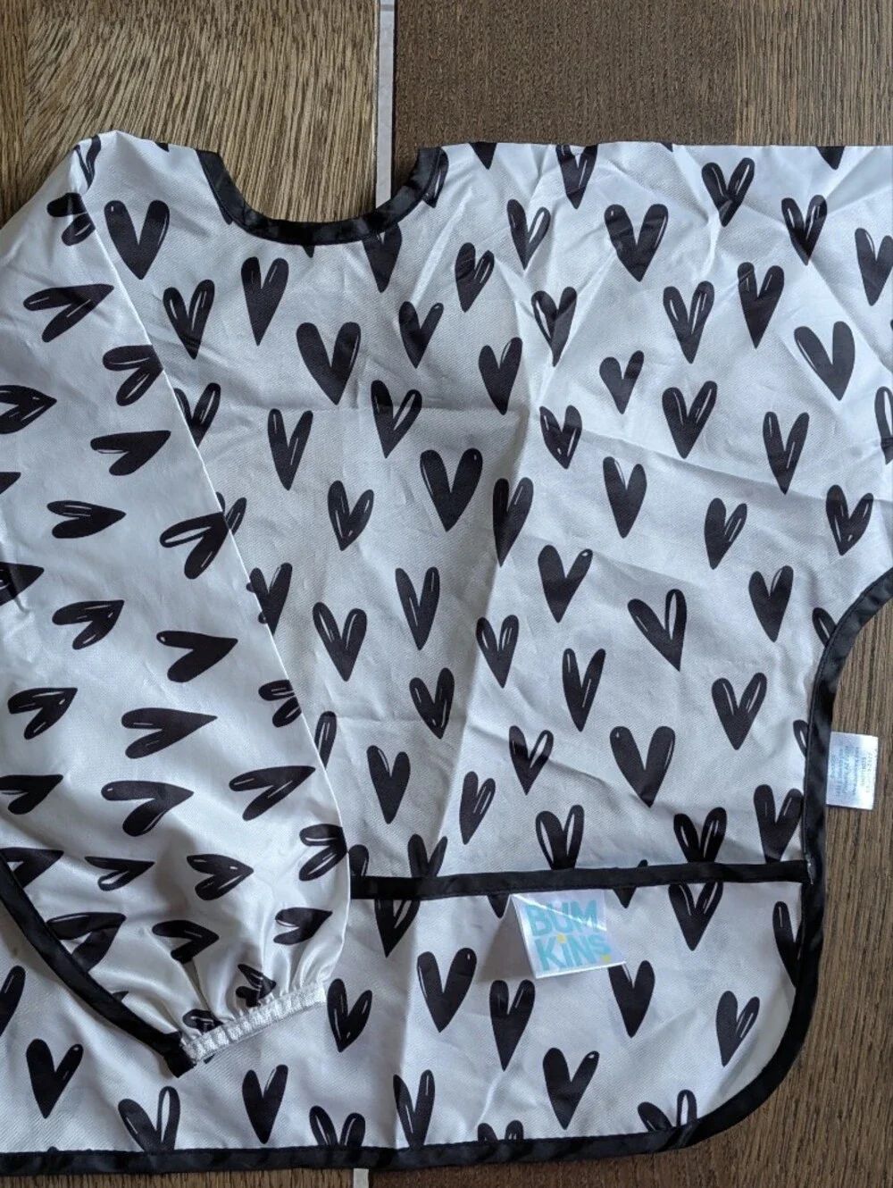 Bumkins White Bib Smock with Black Heart Print